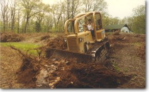 Moving soil on site.